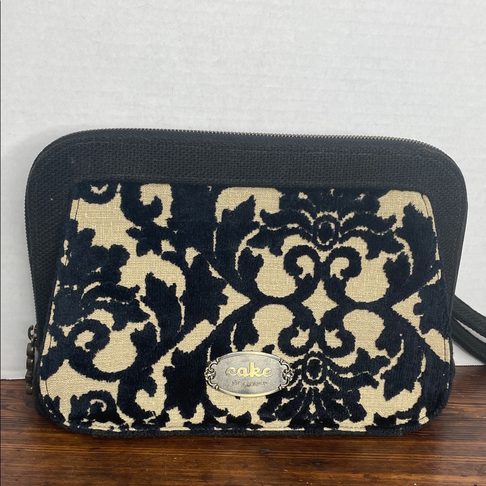 Cake by Petunia black/cream tapestry clutch diaper bag